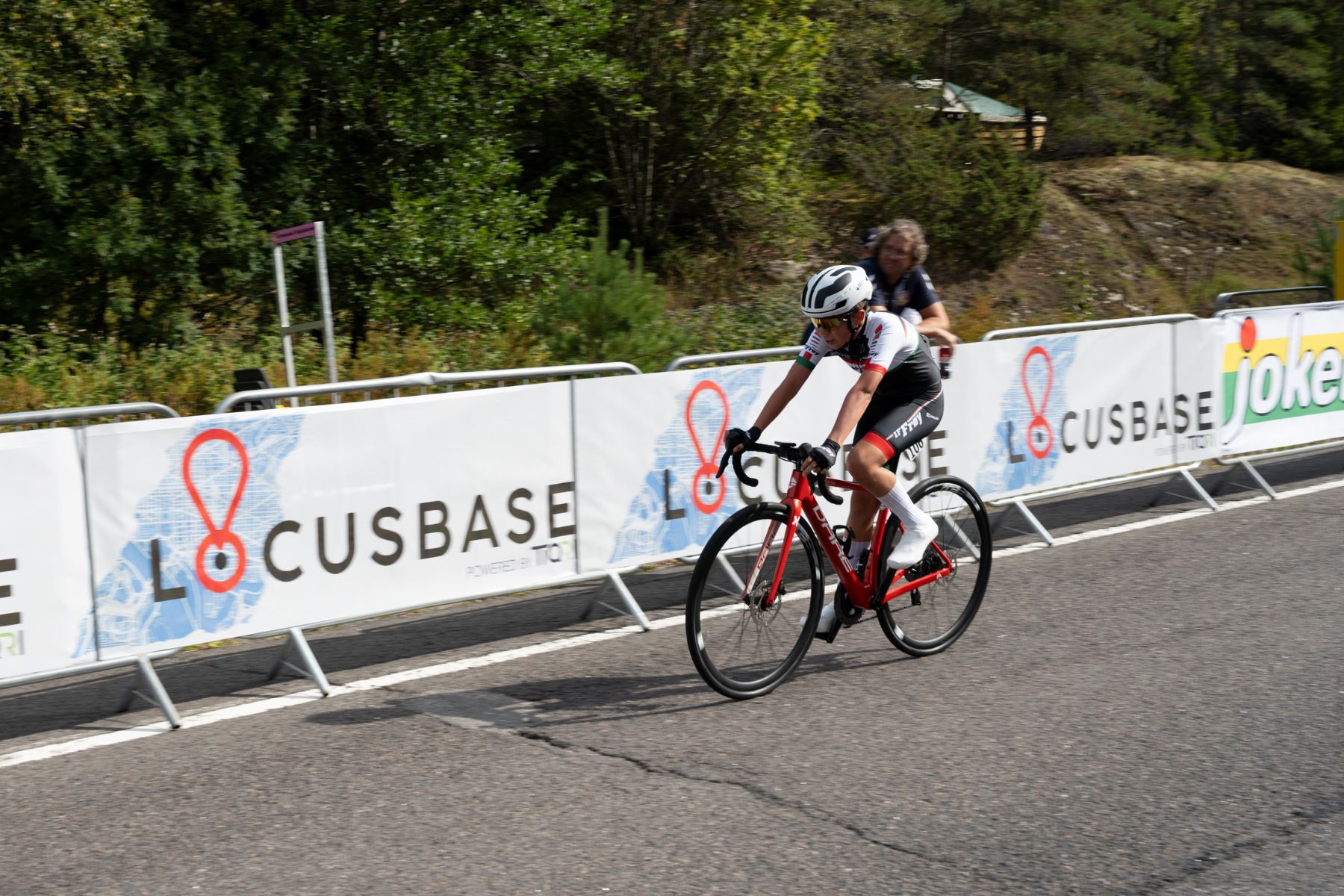 Rider passing LocusBase course barriers