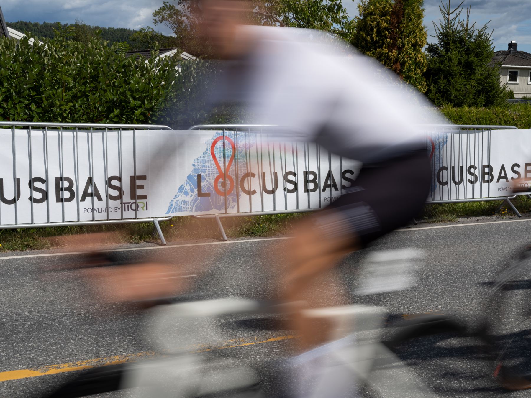 Rider passing LocusBase course barriers
